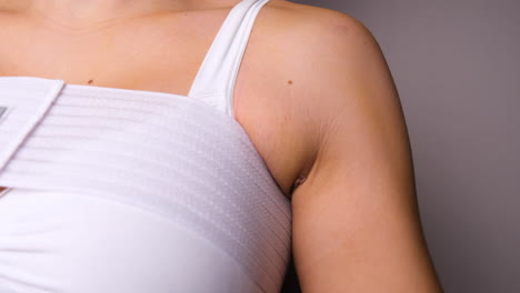 Close-Up-Of-Female-Post-Surgery-With-Transaxillary-Breast-Augmentation-Scar-Under-Armpit