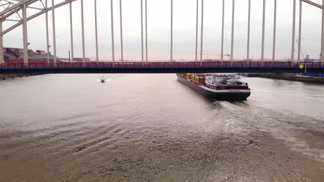 Bolero-Cargo-Ship-Passing-Bridge-Over-The-Noord-In-Hendrik-Ido-Ambacht