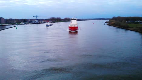 Aerial-View-Of-Forward-Bow-Of-A2B-Comfort-Ship-Navigating-Along-Oude-Maas
