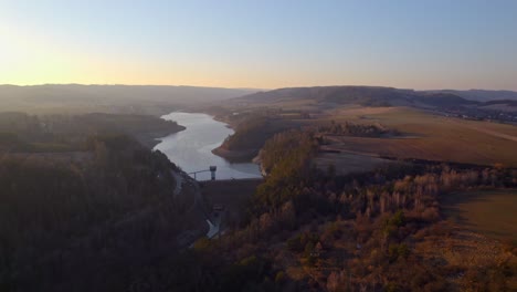 Aerial-Drone-Above-Calm-Valley-With-Water-Reservoir-Kretinka-In-Czech-Republic-At-Dawn