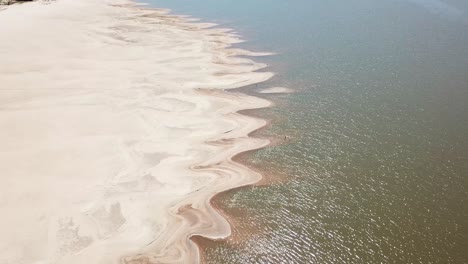 Drone-shot-of-pattern-in-the-river-sand