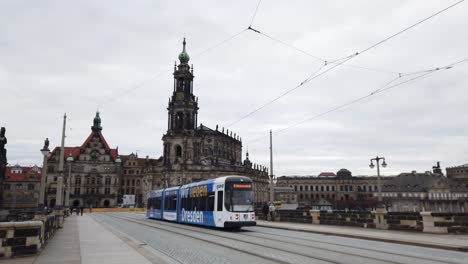 Fast-Moving-Tram-on-Bridge-across-Elbe-River-next-to-Dresden-Castle