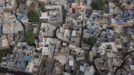 Aerial-shows-crowded-old-world-streets-in-Jodhpur,-Rahasthan,-India