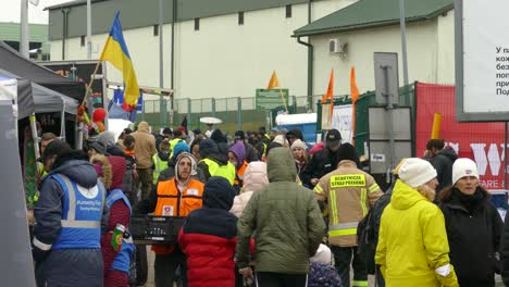 Ukrainian-refugees-and-help-workers-at-base-camp-by-Polish-border