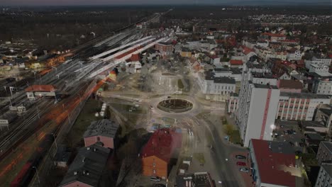 Aerial-drone-hiperlapse-of-center-Kędzierzyn-Koźle-during-rush-hours---Day-to-night-Transition