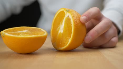 Cutting-fruit-in-half-with-a-sharp-knife