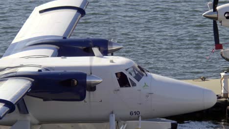 Close-Up-Of-Seaplane-Floating-At-The-Docking-Terminal-Of-Vancouver-Harbour-In-British-Columbia,-Canada