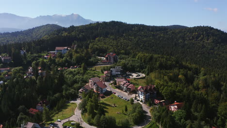 Aerial:-Predeal-mountain-resort-town-in-Romania-Bucegi-mountains,-Prahova-Valley