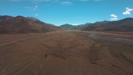 Drone-Flying-Alongside-Power-Lines-Next-to-Clarence-River-New-Zealand