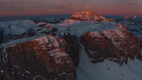 Drone-rises-at-sunset-over-the-Dolomite-mountains