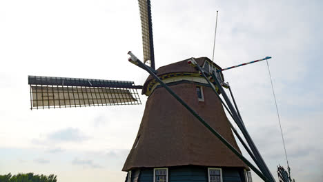 Close-up-of-the-wings-of-a-windmill-turning-in-Holland
