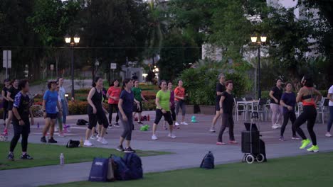 Group-of-people-doing-outdoors-Zumba-at-the-park,-Zhong-Shan,-Balestier,-Singapore