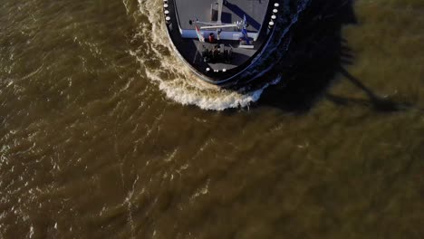 Aerial-Over-Forward-Bow-Of-Colorado-Cargo-Container-Ship-Navigating-Oude-Maas-In-Zwijndrecht