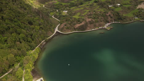 Aerial-tilt-and-pan-of-lake-Lough-Hyne,-Ireland