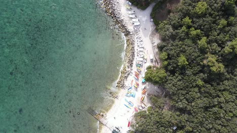 Italy-beach-with-boats-and-kayaks