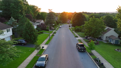 Reverse-drone-shot-of-small-town-street-in-America