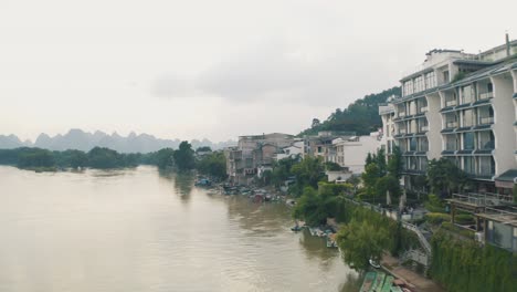 Inundación-En-China,-Río-Lijiang-Que-Causa-Un-Desastre-Natural-En-El-Continente,-Aéreo