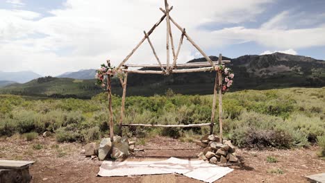 Wedding-Ceremony-Arch-Made-of-Wood-and-Covered-in-Flowers-in-the-Mountains-of-Utah-for-a-Small-Elopement-1080p-60fps