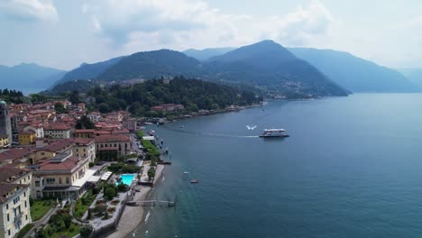Aerial-View-Of-Lakefront-Near-Bellagio-With-Ferry-Leaving-Across-Lake-Como