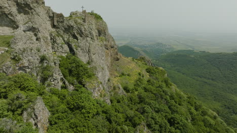 Drone-shot-of-two-Christian-crosses-located-in-the-ruins-of-Azeula-Fortress