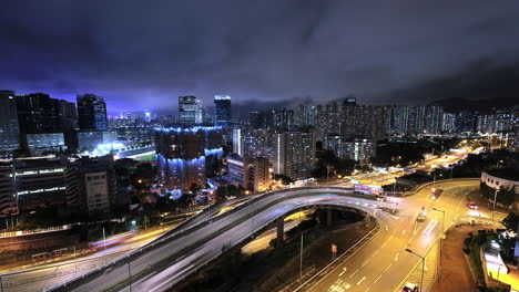 4K-Nachtzeitraffer,-Der-Starke-Lichtverschmutzung-In-Der-Stadt-Kowloon-Bay,-Hongkong,-Zeigt