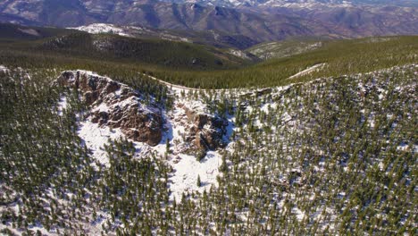 4K-Drone-Footage-Flying-Above-Circling-Around-Snowy-Alpine-Mountain-Top-Summit-In-Mount-Evans-Rocky-Mountains-Colorado,-USA