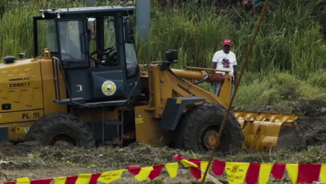 Race-track-is-being-prepared-via-bulldozer-for-day-2-of-motocross-competition