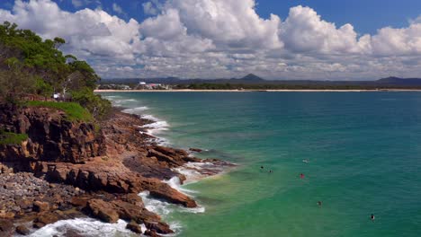 Tourist-At-The-Rocky-Beach-In-Noosa-National-Park-At-Boiling-Pot-Lookout-In-Coastal-Walk,-Noosa-Heads-QLD,-Australia