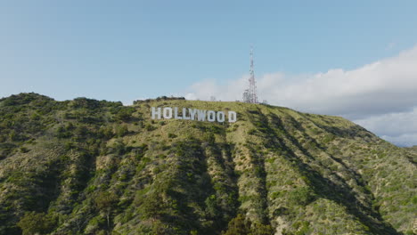Made-it-to-Hollywood,-Aerial-Drone-Shot-of-Famous-Hollywood-Sign-Nestled-in-Hills-on-Sunny-California-Day