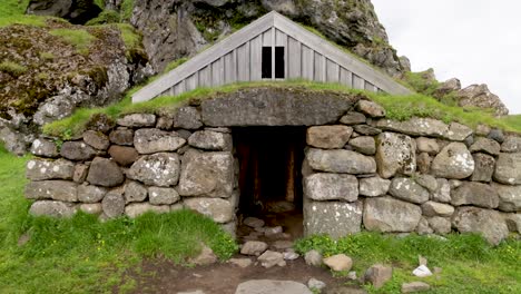 Ancient-stone-house-in-rural-Iceland-with-gimbal-video-walking-forward