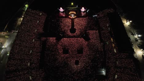 Static-aerial-view-of-ColdPlay-concert-in-big-stadium-at-night