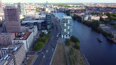 Skyscraper-luxury-lofts-on-the-waterfront
Wonderful-aerial-view-flight-tilt-down-drone-footage-of-East-Side-Gallery-Berlin-Friedrichshain-sunny-Summer-day-2022