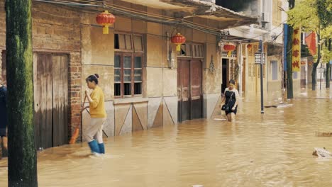 Flooded-City-Street,-Chinese-People-Facing-Natural-Disaster-Aftermath