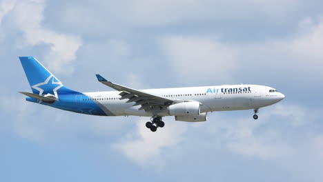 Twin-engine-330-Air-Transat-aircraft-with-flaps-extended-and-undercarriage-down-reduces-speed-for-landing