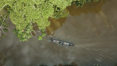 4k-aerial-shot-of-passenger-boat-sailing-in-the-Amazon-river