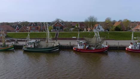 Drone-flight-over-a-tranquil-and-idyllic-fishing-port-in-germany
