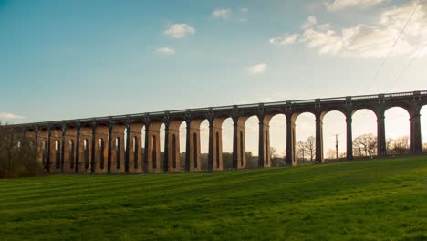 Time-lapse-of-clouds-passing-by-over-Ouse-Viaduct-at-sunset