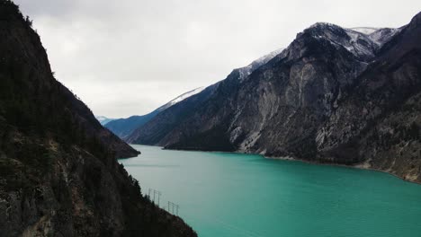 Pullback-aerial-shot-of-Seton-Lake-near-Lillooet-in-British-Columbia,-Canada