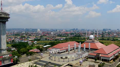 Aerial-view-Semarang-city,-Great-Mosque-of-Central-Java-and-magnificent-minaret