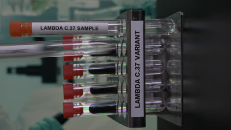 Lambda-C37-Variant-Test-Tube-Samples-Being-Removed-From-Rack