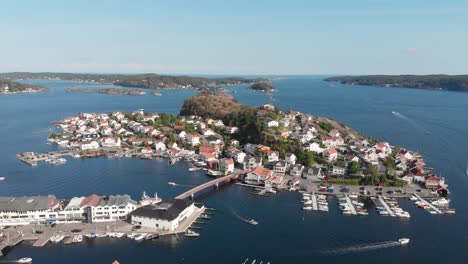Drone-view-of-charming-Kragero-harbour-town,-Telemark,-Norway