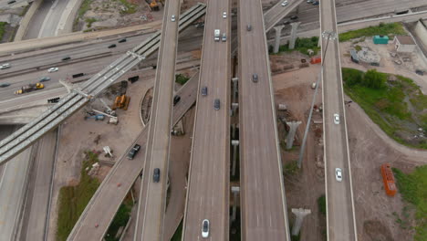 Brids-eye-view-of-traffic-on-610-and-59-South-freeway-in-Houston,-Texas
