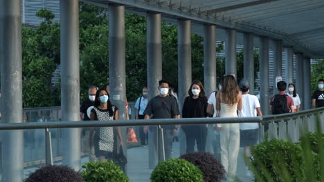 Crowd-of-people-wearing-medical-face-mask