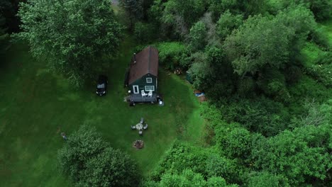 A-high-zoom-reveal-of-a-small-secluded-cabin-off-the-grid-in-the-Catskill-Mountains-New-York