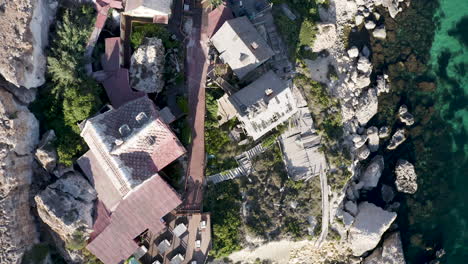 Popeye-village-theme-fun-park-in-Malta,sunny,overhead-aerial-view
