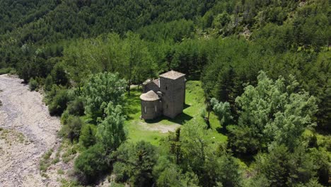 Circular-drone-view-of-a-mountain-church