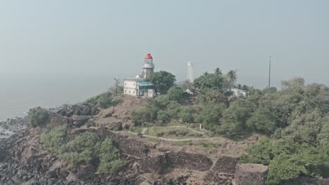 Circling-drone-shot-of-Indian-Lighthouse-on-fort-island
