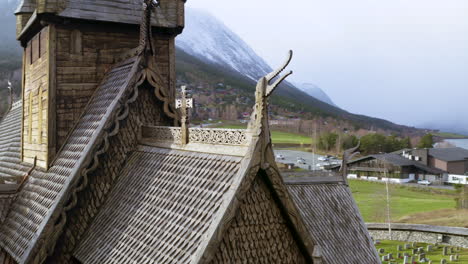Exterior-Design-Detail-Of-Lom-Stave-Church-In-Lom-Municipality,-Innlandet-County,-Norway---aerial-drone-shot