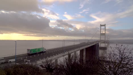 Traffic-crosses-the-Severn-Bridge-linking-England-with-Wales-near-to-Bristol,-UK