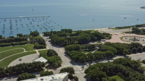 Chicago-Illinois-Aerial-v65-birds-eye-view-drone-fly-around-downtown-urban-grant-park,-pan-tilt-up-shot-capturing-museum-campus-with-endless-horizon---August-2020